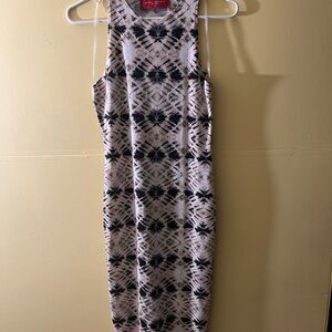 Elegant Black and Cream Geometric Midi Dress